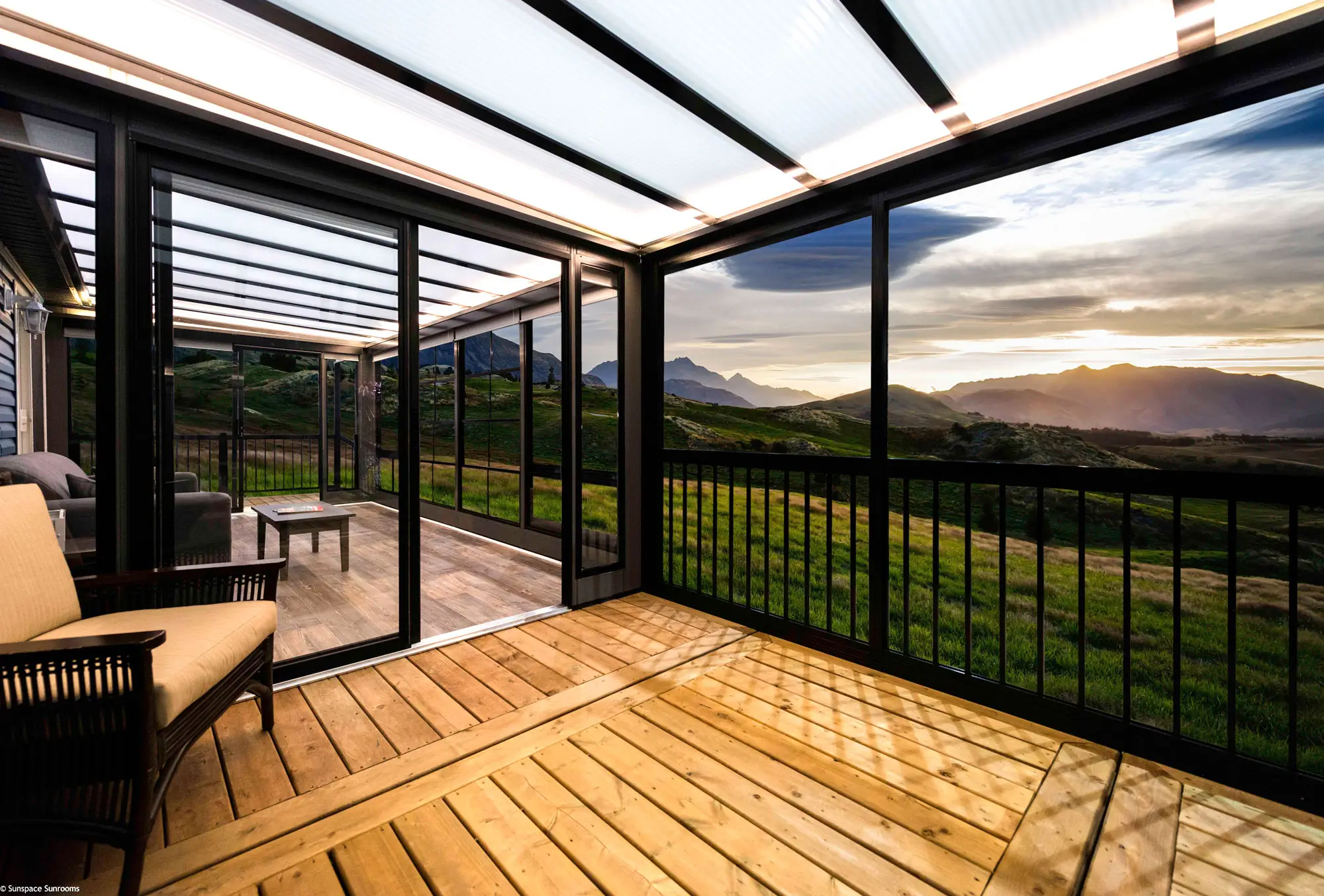 A beautiful deck with mountain views and a welcoming patio, ideal for relaxation and enjoying nature.