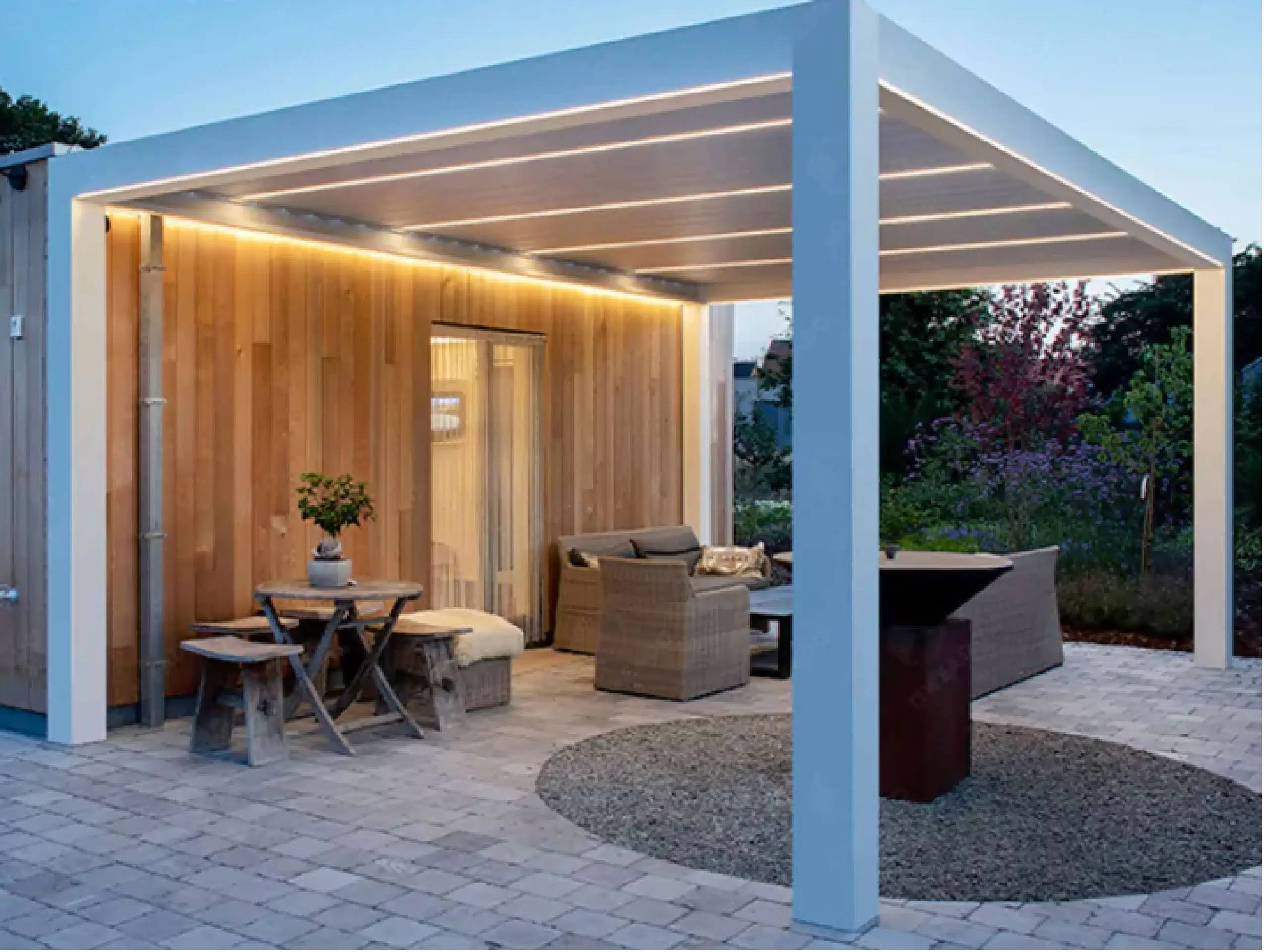 A patio featuring a Pergola and stylish outdoor furniture, creating a cozy and inviting outdoor space.