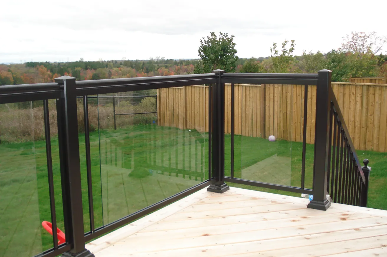 Lack deck Railings with glass panels.