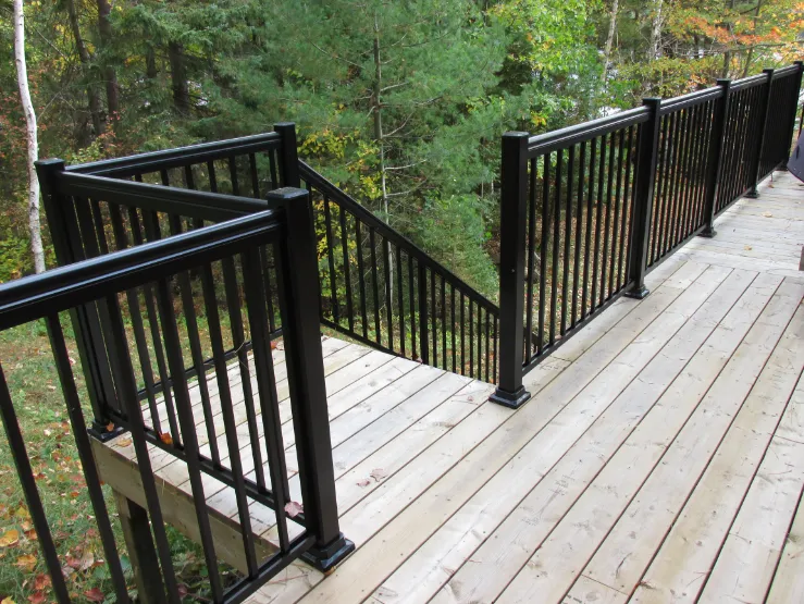 Black Aluminum Picket Railing on Wooden Deck with Stair Access